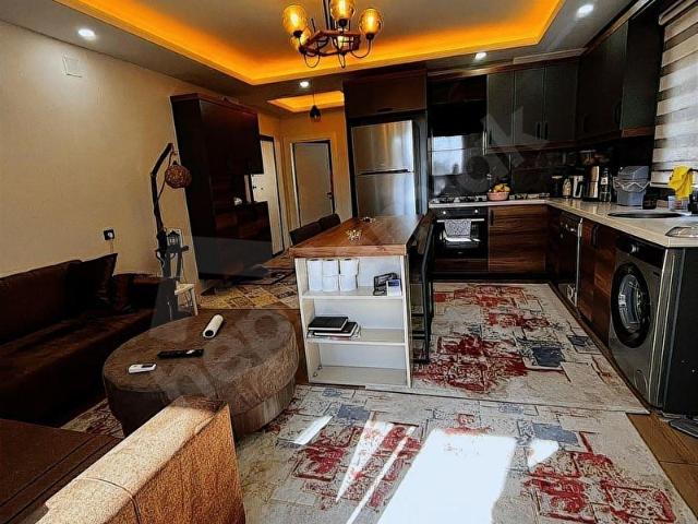 ERDEMLİ AŞAĞI ALATA'DA SATILIK 1+1 HAVUZLU OTOPARKLI DAİRE