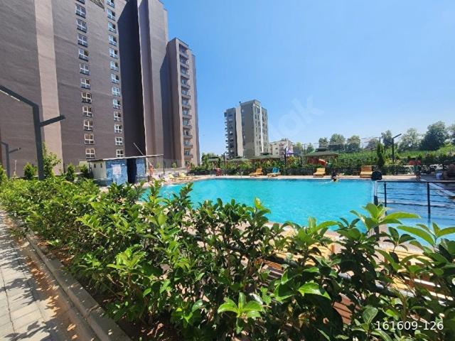 ERDEMLİ ARPAÇBAHŞİŞDE SATILIK 1+1 HAVUZLU SIFIR DAİRE