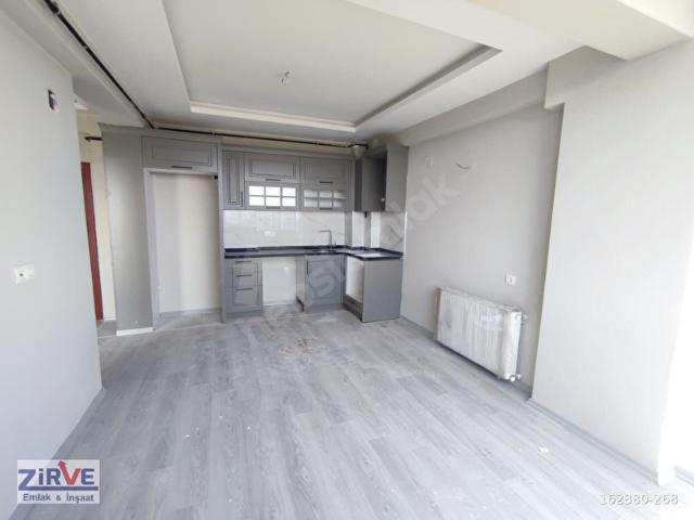 ERDEMLİ ÇEŞMELİ DENİZ MANZARALI İSKANLI SIFIR 1+1 SATILIK DAİRE