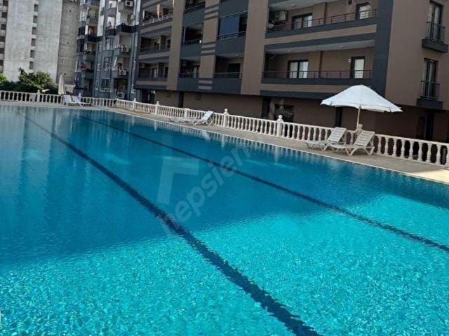 ERDEMLİ TÖMÜK'TE 2+1 YÜZME HAVUZLU SIFIR SATILIK DAİRE