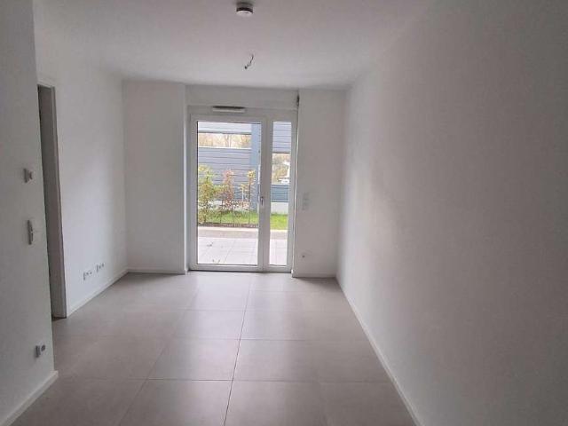Erdgeschoss Apartment mit Balkonblick und moderner Fliesengestaltung in Dortmund – An der Witwe
