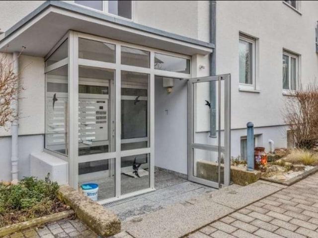 Erdgeschosswohnung mit Balkon