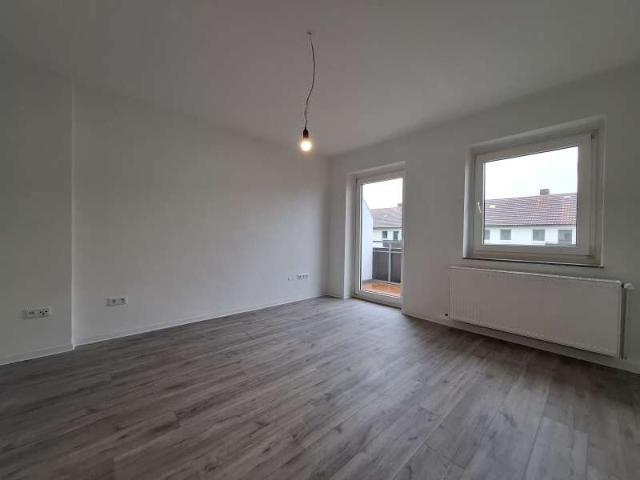 Erdgeschosswohnung mit Balkon