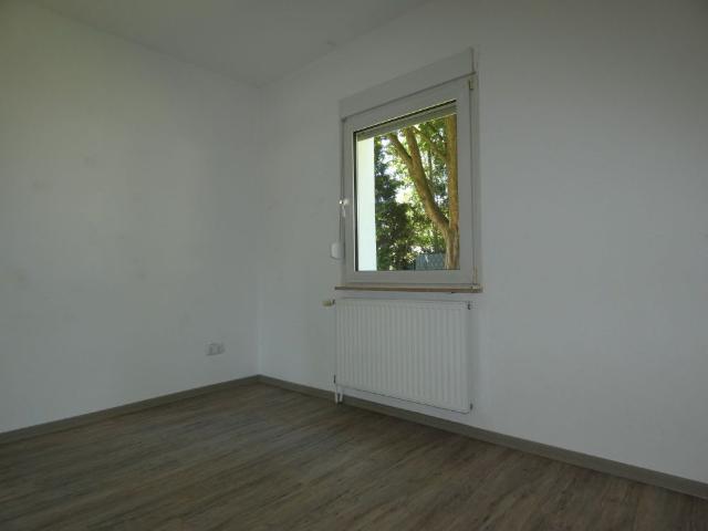 Erdgeschosswohnung mit Balkon in schöner Lage!