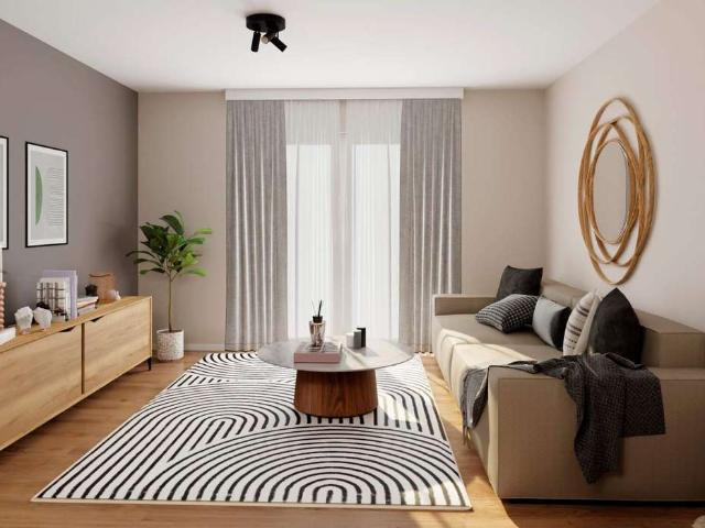 Erdgeschosswohnung mit Terrasse, eigenem Gartenanteil und zwei Bäder