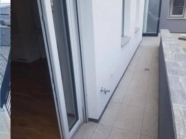 Erdgeschosswohnung Neubau 56m2 mit Garten und Garage