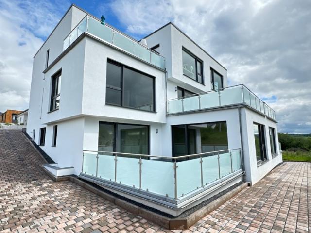 Erstbezug 3 ZKB mit Terrasse, provisionsfrei in nachhaltig effizientem MFH