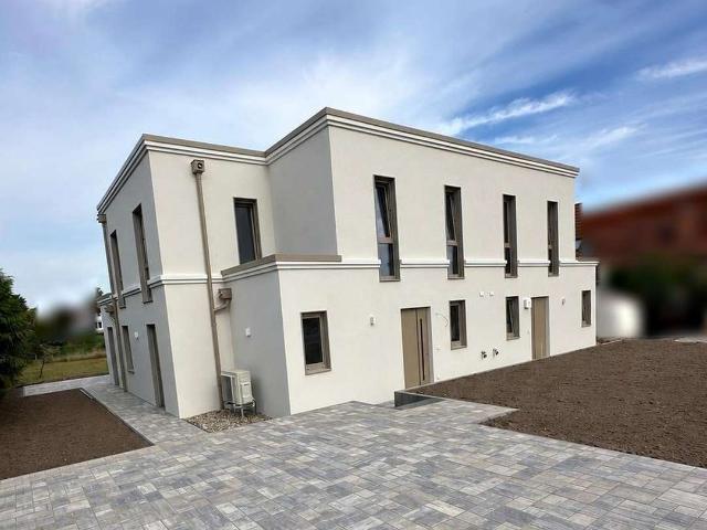 Erstbezug 2026: Doppelhaushälfte im Süden Magdeburgs Garten, Kamin, Wärmepumpe, 150 m², A