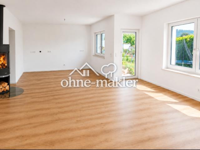 Erstbezug 2 Zimmer Wohnung mit eigenem Garten und Garage