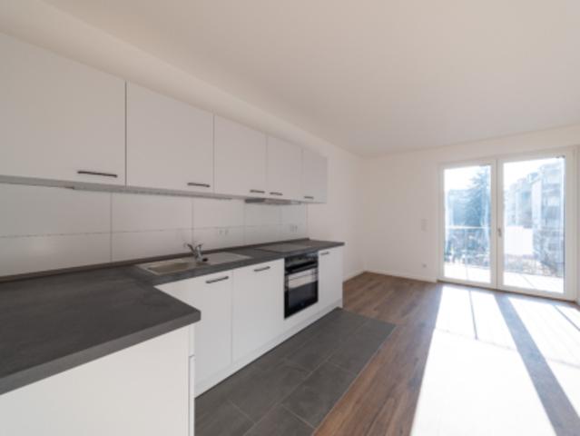 Erstbezug! 2 Raumwohnung mit Einbauküche und Tiefgaragenstellplatz WE14