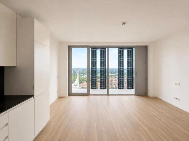 Erstbezug: 34. Etage DC2 Tower Kompaktes Premium Studio mit Loggia