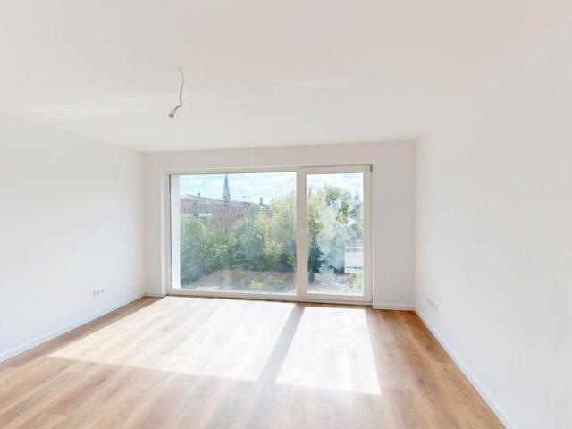 Erstbezug: Charmante 3 Zimmer Dachgeschosswohnung