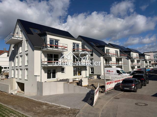 Erstbezug A+: EG 4 Zi. Wohnung 105m², Garten, EBK, TG mit Wallbox