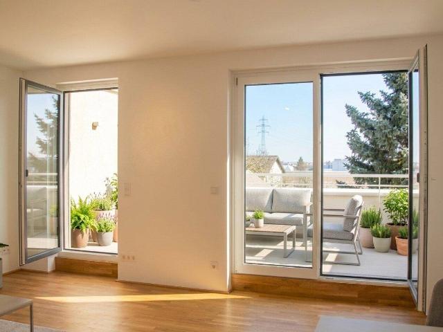 Erstbezug am Mühlwasser – 2 Zimmer Dachgeschosswohnung mit Terrasse und Balkon