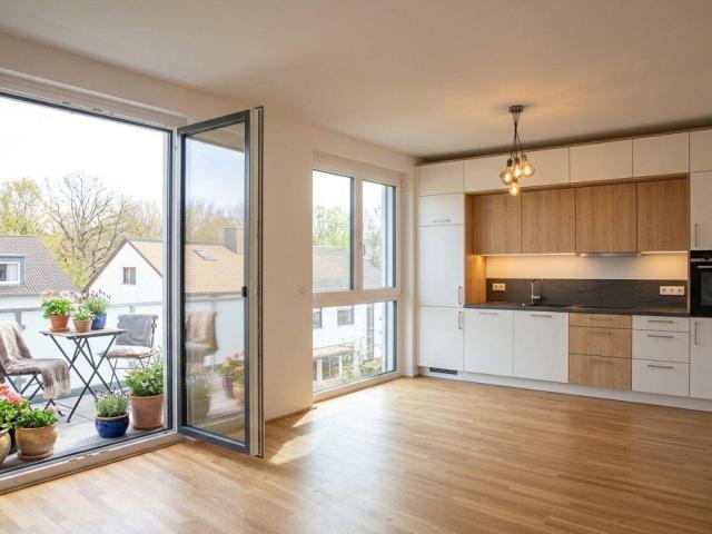 Erstbezug am Mühlwasser – 2 Zimmer Dachgeschosswohnung mit Terrasse und Balkon