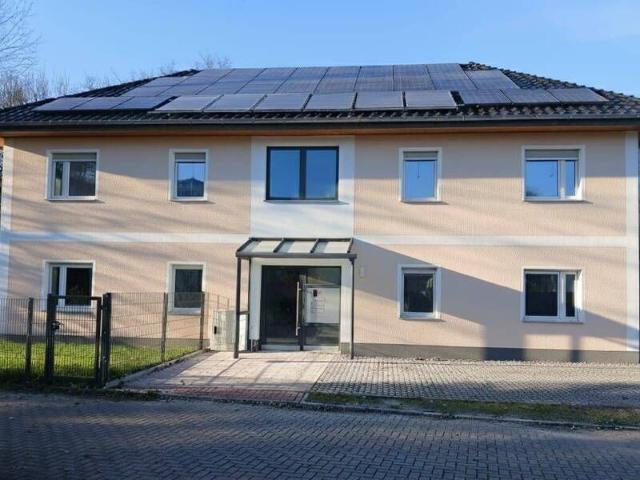 Erstbezug am See! 4 Zimmer Maisonette mit Wintergarten & Balkon