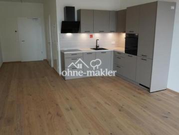 Erstbezug am Steinberger See – hochwertige Neubauwohnung mit Terrasse, Küche & Stellplatz