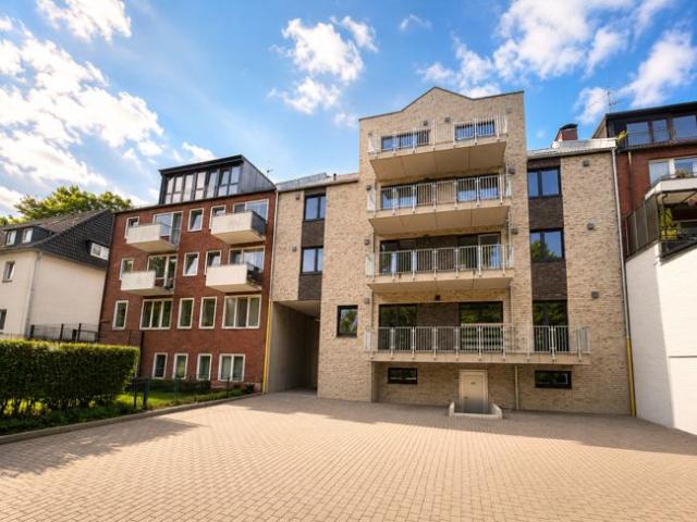 Erstbezug: Großzügige 3 Zimmer Wohnung mit Balkon und modernem Wohnkomfort