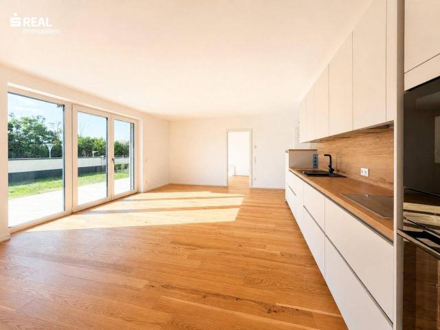 Erstbezug: elegante 3 Zimmer Gartenwohnung mit moderner Küche