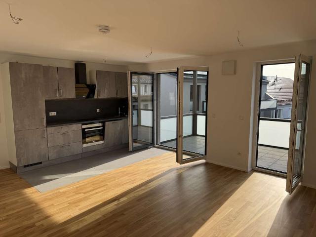 Erstbezug | exklusive 3,5 Zimmer Wohnung | Einbauküche | Balkon | Einzelgarage | KFW55 | ER Zentrum