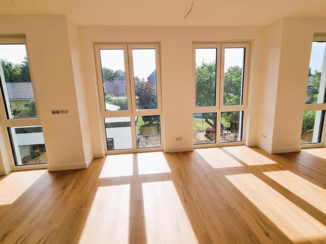 Erstbezug im Grünen: Exklusive 3,5 Zi. Wohnung mit Premium EBK & privatem Garten