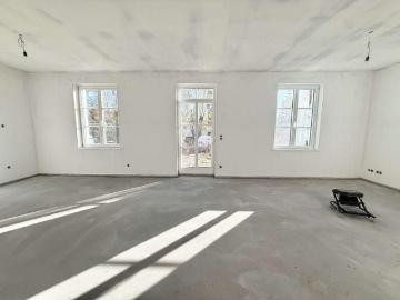 Erstbezug im Neubau – Hochparterre Wohnung im Zweifamilienhaus mit Terrasse & großem Gartenanteil