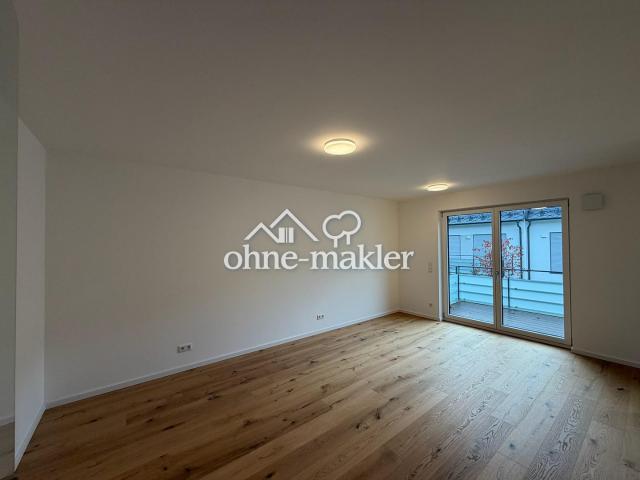 Erstbezug im Neubau: 2 Zimmer mit Einbauküche, Parkett und Fußbodenheizung am Hachinger Bach