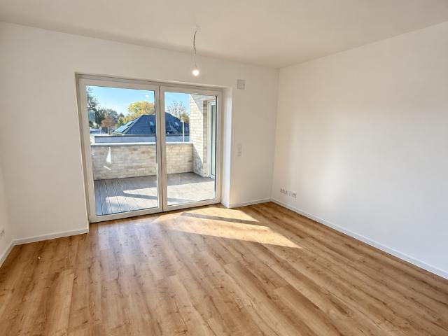 Erstbezug in Loxstedt Nesse: Moderne 3 Zimmer Wohnung mit überdachtem Balkon
