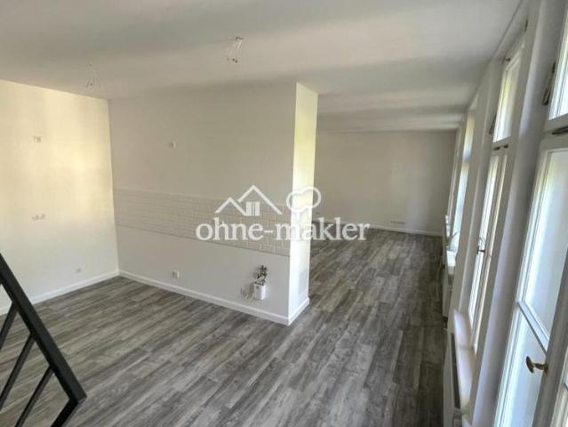 Erstbezug: Maisonette Wohnung mit Loft Charakter und großem Garten