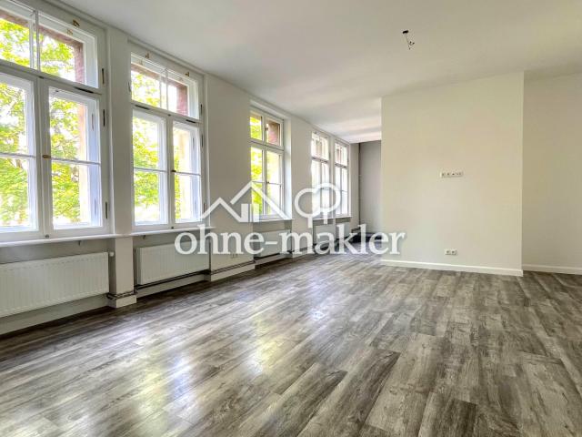 Erstbezug: Maisonette Wohnung mit Loft Charakter und großem Garten