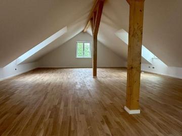 Erstbezug mit Dachboden, großem Balkon und eigenem Grundstücksanteil