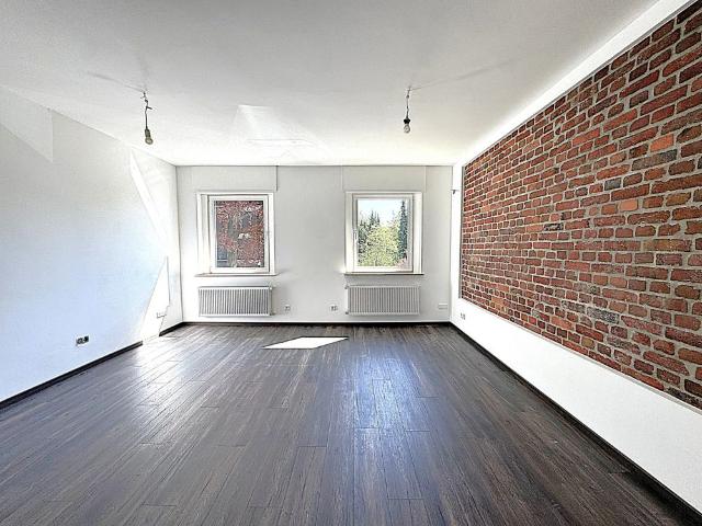 Erstbezug nach Kernsanierung – Stilvolle Maisonettewohnung mit Dachterrasse und Panoramablick