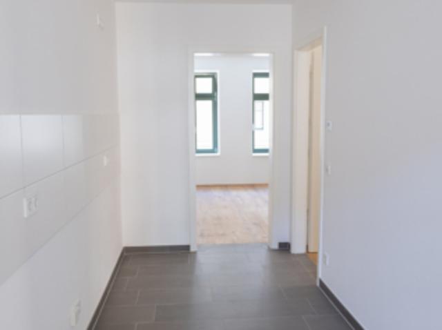 Erstbezug nach Sanierung – Attraktive Altbauwohnung mit Fußbodenheizung – WE05