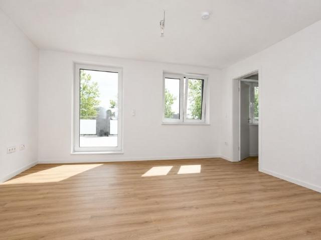 Erstbezug Neubauwohnung mit Einbauküche, Dachterrasse mit Markise und PKW Stellplatz in Altenoythe