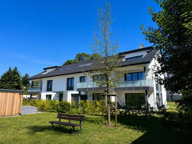 Erstbezug: Neubauwohnung mit Einbauküche, Loggia & Stellplatz