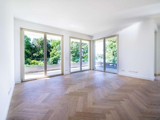 Erstbezug! Schöne 3 Zimmer Erdgeschoss Wohnung mit Privatgarten & Seeblick in Grünheide!