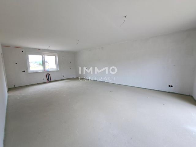 Erstbezug: Reihenhaus in Grünlage mit Terrassen und Eigengarten!
