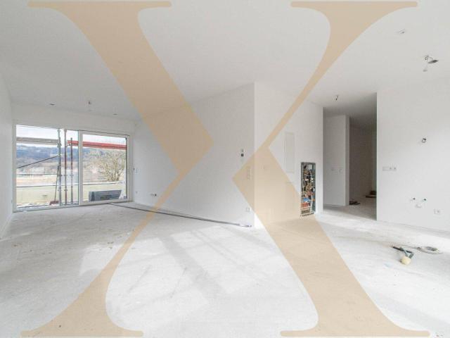 ERSTBEZUG! Traumhafte 4 Zimmer Wohnung mit herrlichem Donaublick mit Eigengarten & Terrasse zu verkaufen!