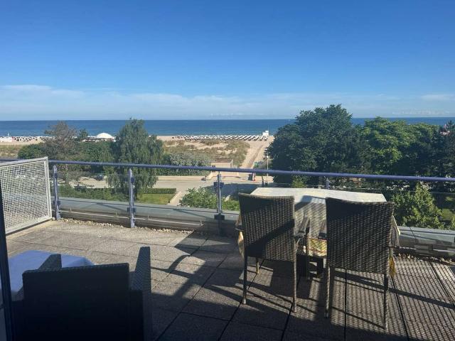 Erste Reihe am Meer – Exklusive Ferienwohnung mit unverbaubarem Ostseeblick, Dachterrasse & TG