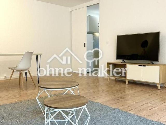 Erstklassig renovierte & möblierte 2 Zimmer Wohnung mit Einbauküche & Tiefgarage