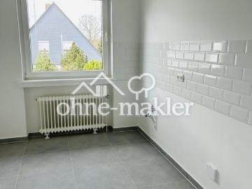 Erstklassig saniert: 3 Zimmer Wohnung mit Weitblick und Südbalkon