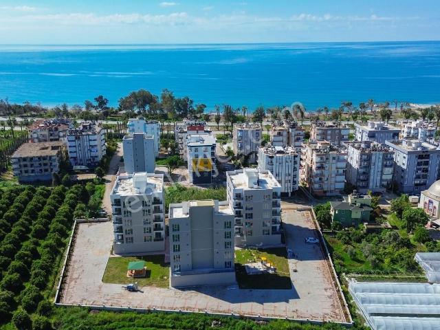 Ertuğrul'dan 2+1 Deniz Manzaralı Havuzlu Site'de Satılık Daire