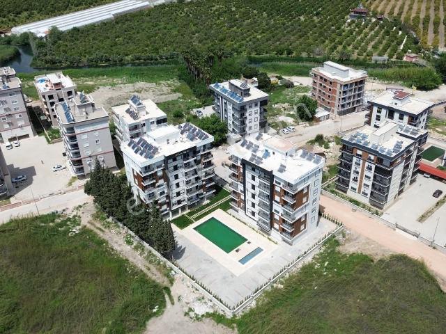Ertuğrul'dan Havuzlu Sitede 1+1 Satılık Daire