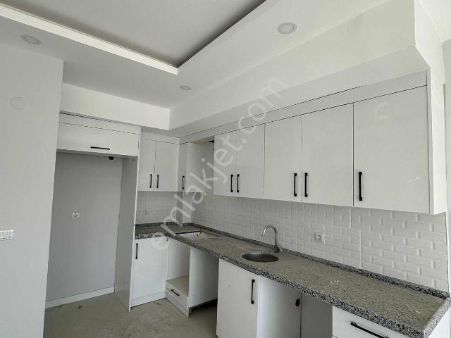 Ertuğrul'dan Oturuma Hazır İskanlı Geniş 1+1 Satılık Daire