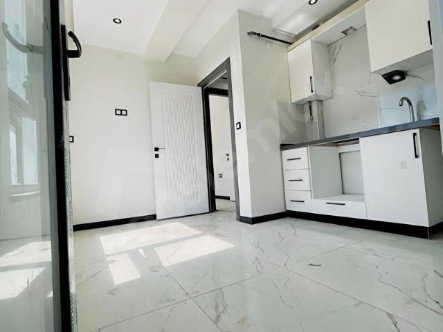 ERTAŞ CADDESİ VE TARİH BULVARI YAKINI SATILIK 2+0 ARAKAT DAİRE