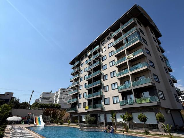 Ewax Property'den Cam Balkonlu Klimalı Kiralık 1+1 Denize 600m