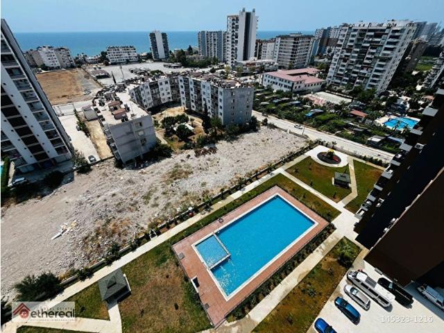 ETHEREAL'DEN TECE'DE EŞYALI HAVUZLU DENİZ GÖREN 2+1 DAİRE