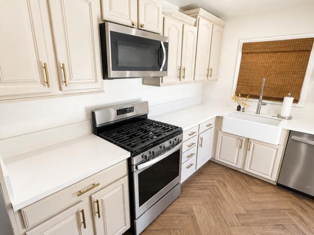 EV Charging Station. Solar savings. Beautifully Updated Home with Designer Flooring, Upgraded Kitchen & Spacious Backyard