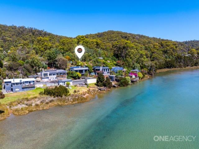 Ever Changing River Side Vistas Await At This Tranquil Property
