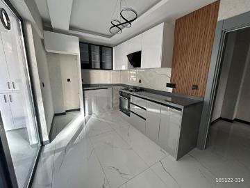 EVİNBİZDE PURSAKLAR MERKEZDE YERDEN ISITMALI 2+1 SIFIR FIRSAT!